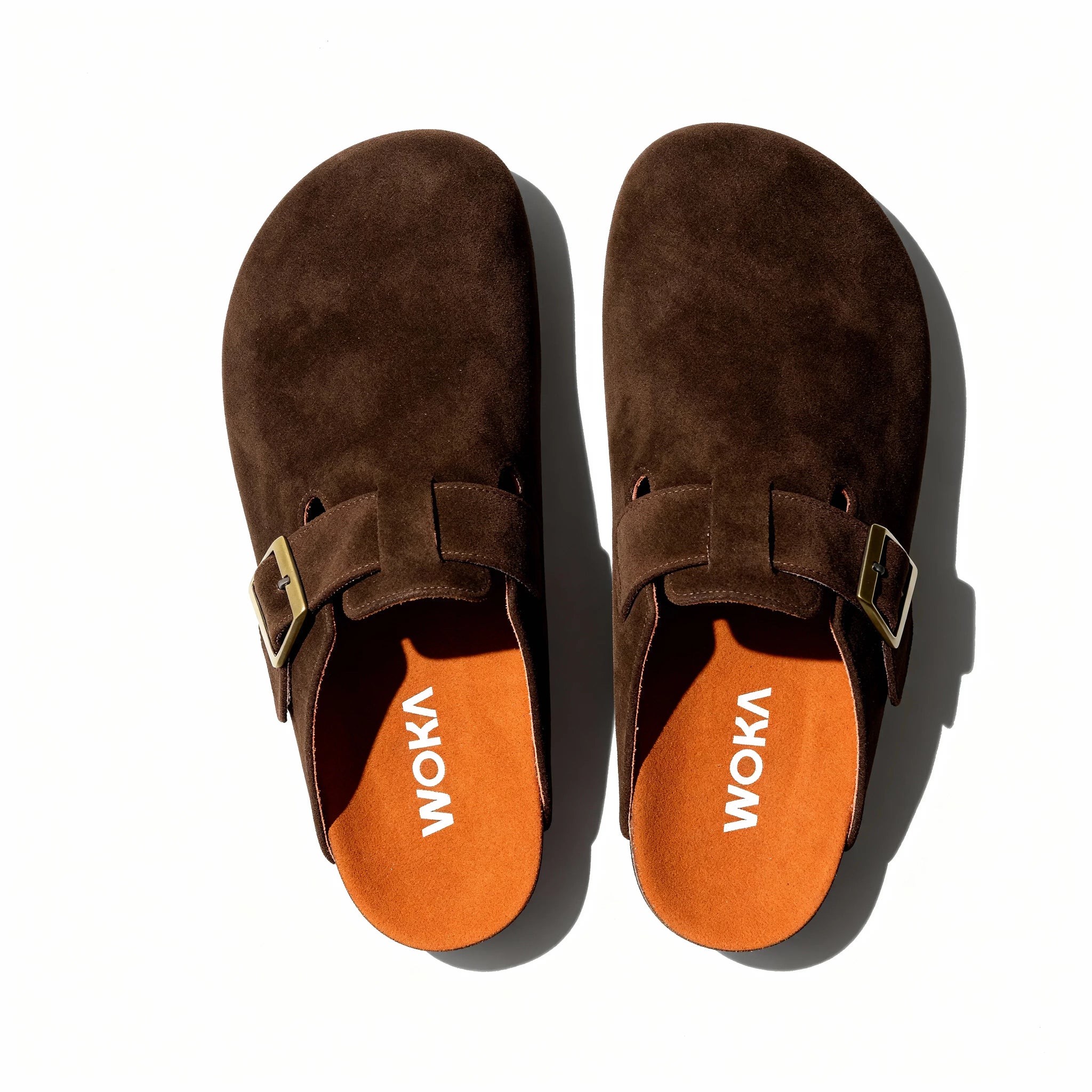 WOKA brown suede clogs with buckles, premium comfortable footwear on white background